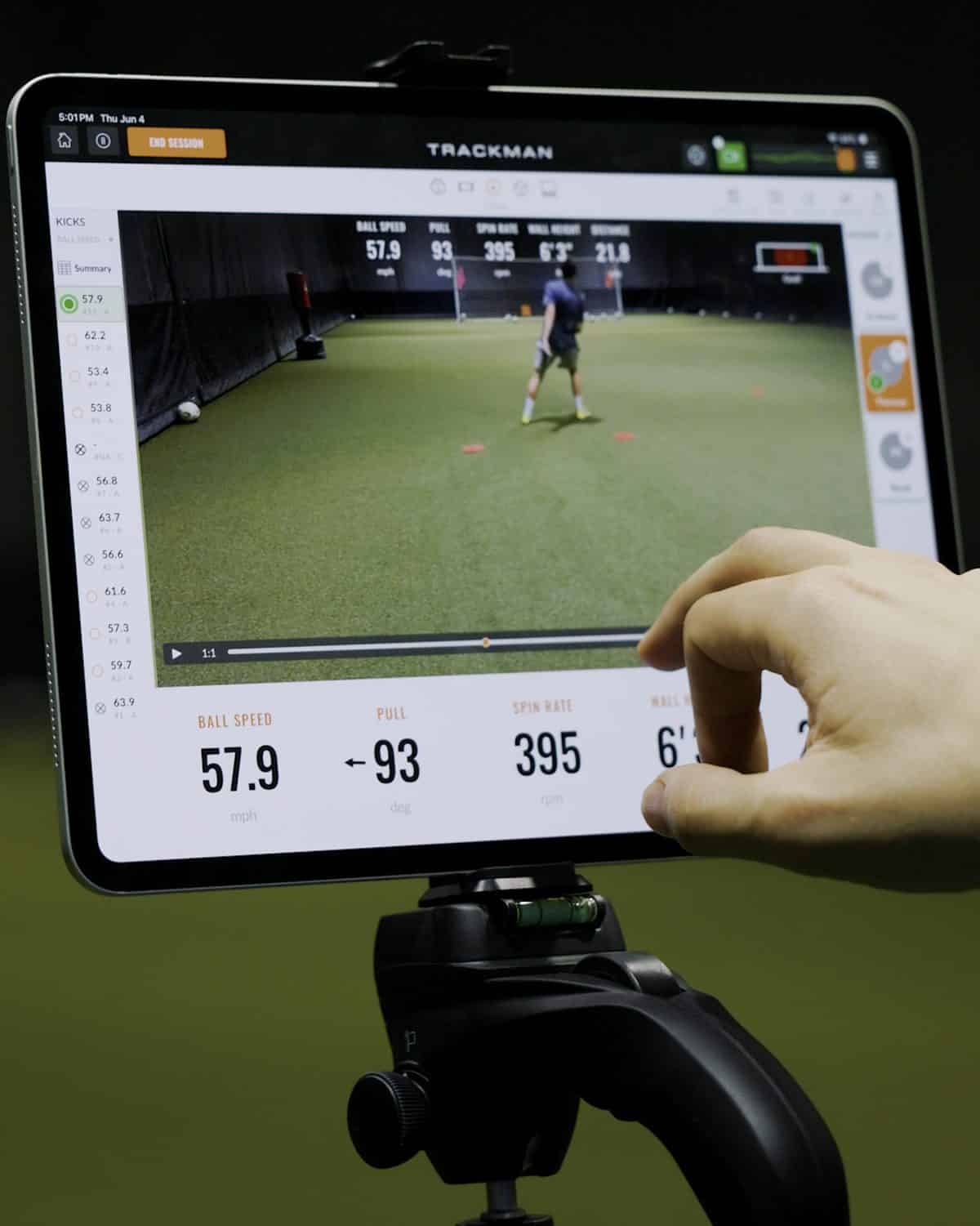 TrackMan tablet showing ball speed, spin rate and accuracy data during shooting training at Soccer Field Academy in Columbus, Ohio