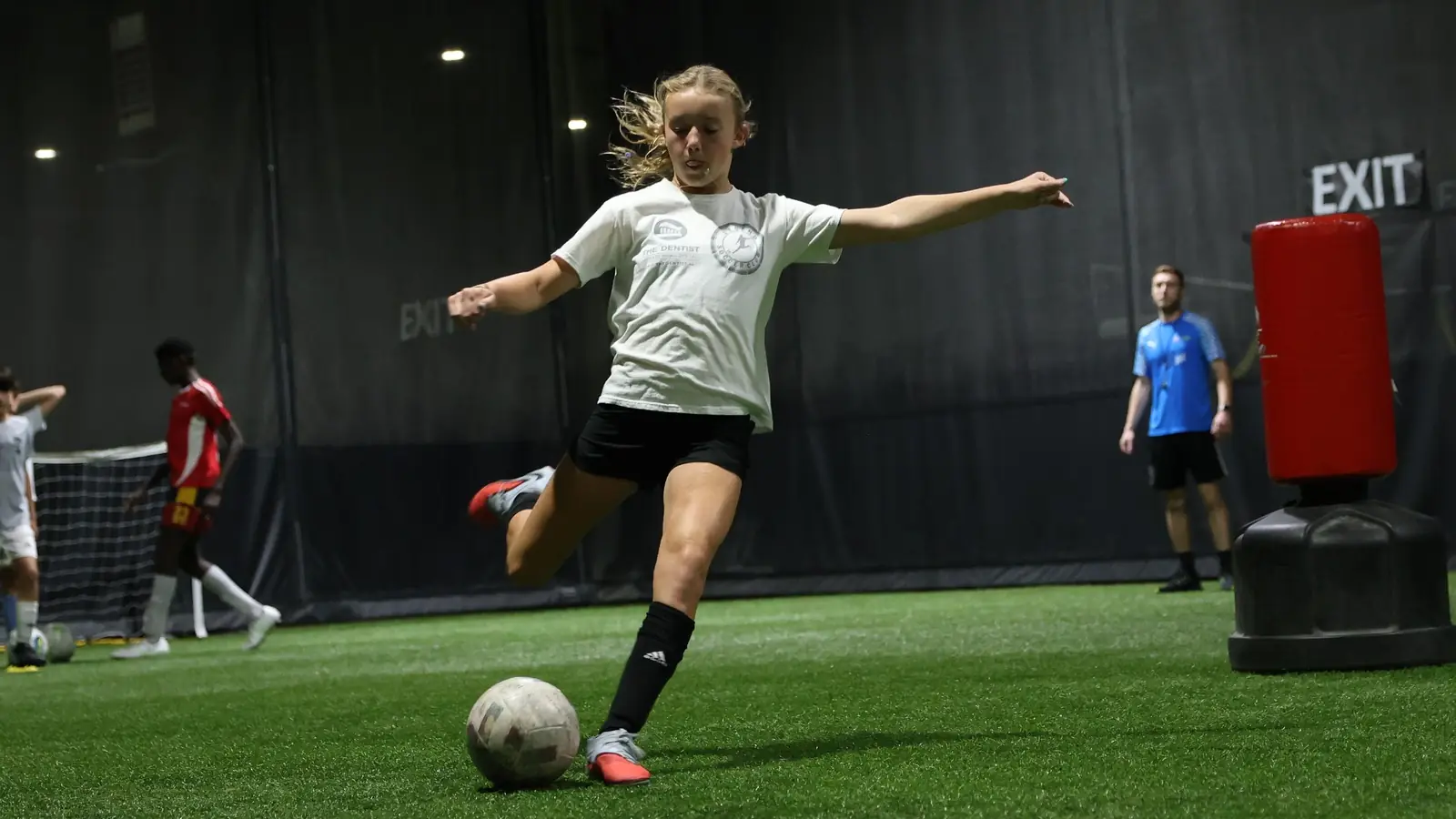 Young player striking a ball at goal during a Finishing Factory session at Soccer Field Academy in Columbus, Ohio